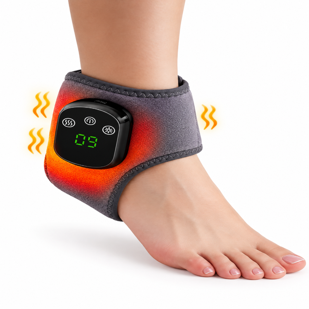 A gray ankle heating pad worn on a person's ankle, shown with a digital temperature display and orange heat wave graphics on a white background.
